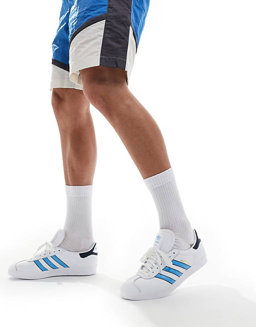 adidas Originals Gazelle sneakers in white and blue